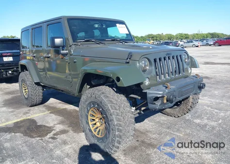 2015 Jeep Wrangler Unlimited Sport z USA, uszkodzony, nr VIN 1C4BJWDG4FL742392